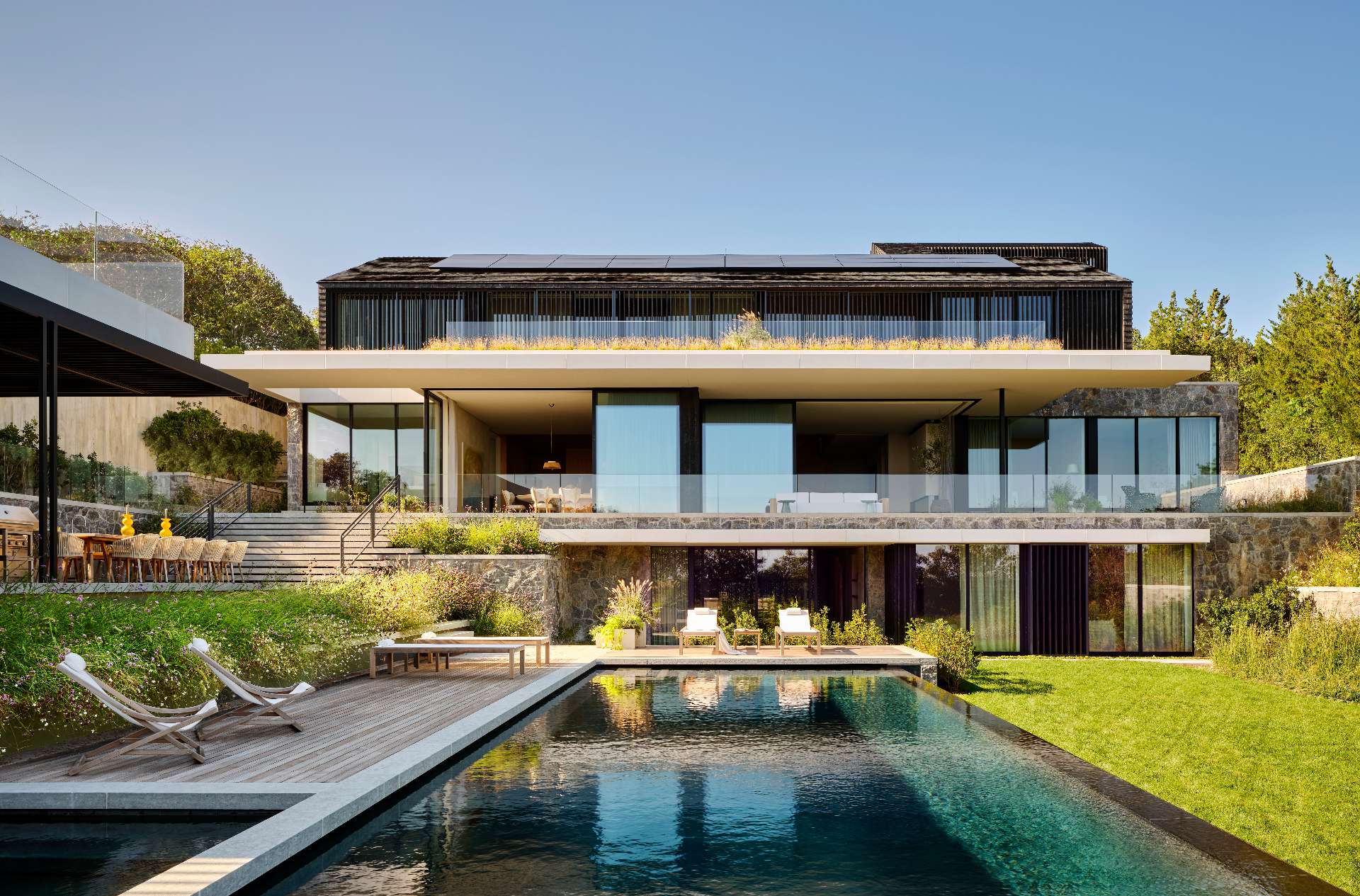 This modern home embraces its rugged coastal setting with quiet confidence, blending architecture and nature in a way that feels both intentional and effortless.