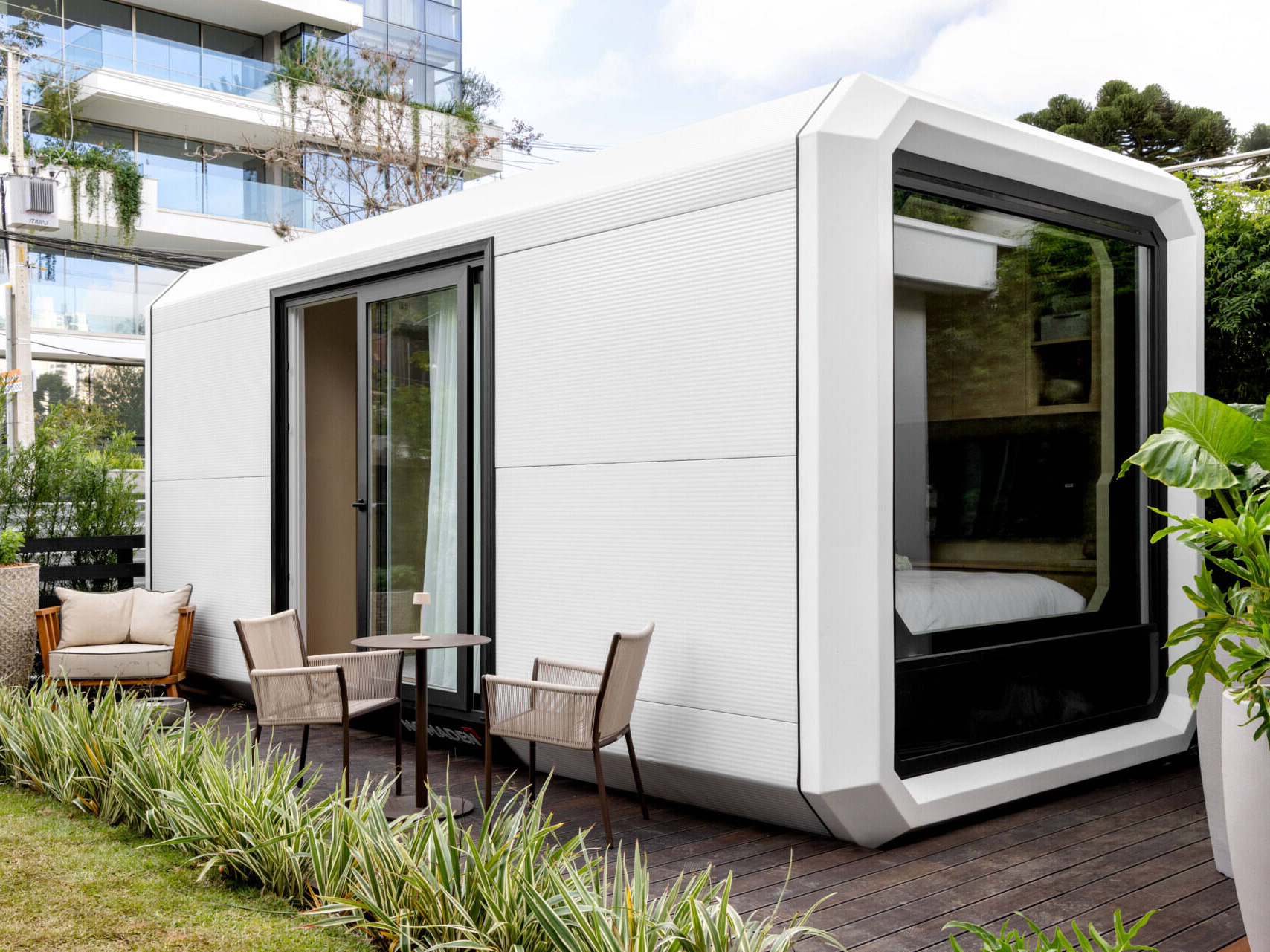 This modular tiny house by Gabriela Casagrande blends minimal design with natural surroundings. Large openings invite in sunlight and fresh air, while the compact form sits lightly on the land. A serene example of sustainable living in just 194 square feet.