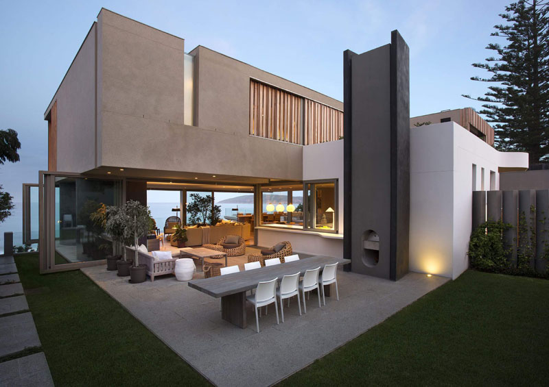 A modern SAOTA home in Plettenberg Bay seems to hover above the dunes, capturing breathtaking views of Robberg Beach.