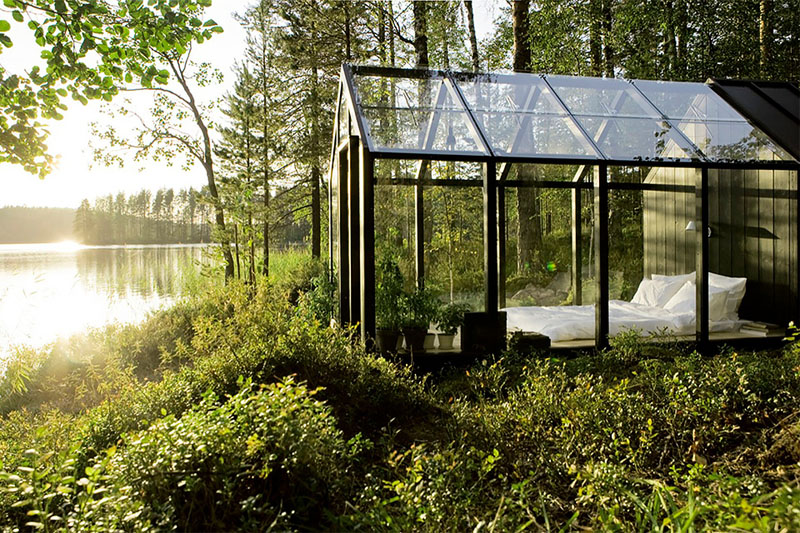 A modular greenhouse and shed designed by Ville Hara and Linda Bergroth combines storage, cultivation, and a bright retreat. Made from Finnish pine and glass, it’s a flexible garden structure with space for plants, tools, and even a bed.
